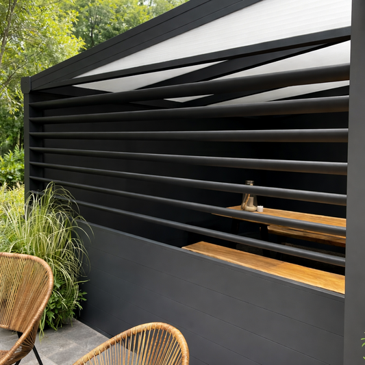 Rotatable louvre panel in anthracite installed on a veranda, slats angled for shade