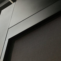 Motorised side screen in black from inside, fabric screen blocking outside view