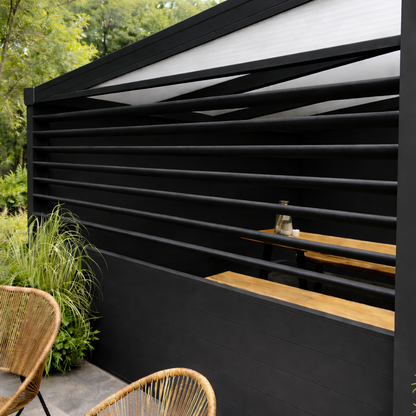 Rotatable louvre side panel in white on a veranda, slats adjusted for privacy