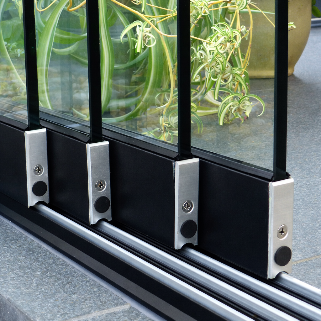 Roma Primo glass sliding doors installed on a veranda, garden room conversion