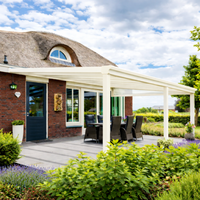 Pigato veranda in anthracite at dusk with integrated LED along the reinforced gutter