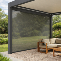 Roma Cortina motorised side screen in anthracite partially lowered on a pergola