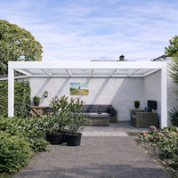 Trebbiano veranda in anthracite from garden, flat roof profile and slim post visible