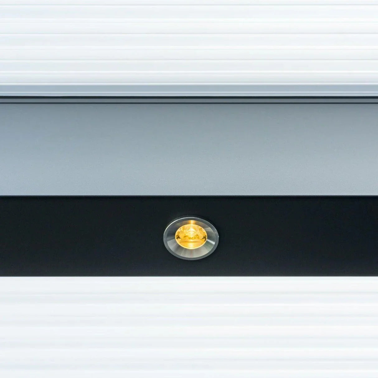 Veranda with Roma Lumino spotlight kit installed, warm white spotlights active at dusk