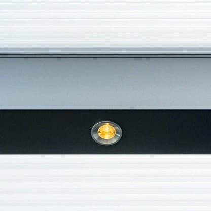 Veranda with Roma Lumino spotlight kit installed, warm white spotlights active at dusk