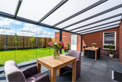 Roma Primo glass doors installed on a veranda showing full glass-to-glass tracking