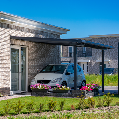 The Fino veranda in cream with polycarbonate roof covering an outdoor seating area