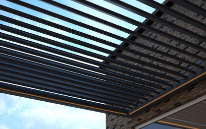 The Portico pergola in white from side showing louvre depth and post spacing