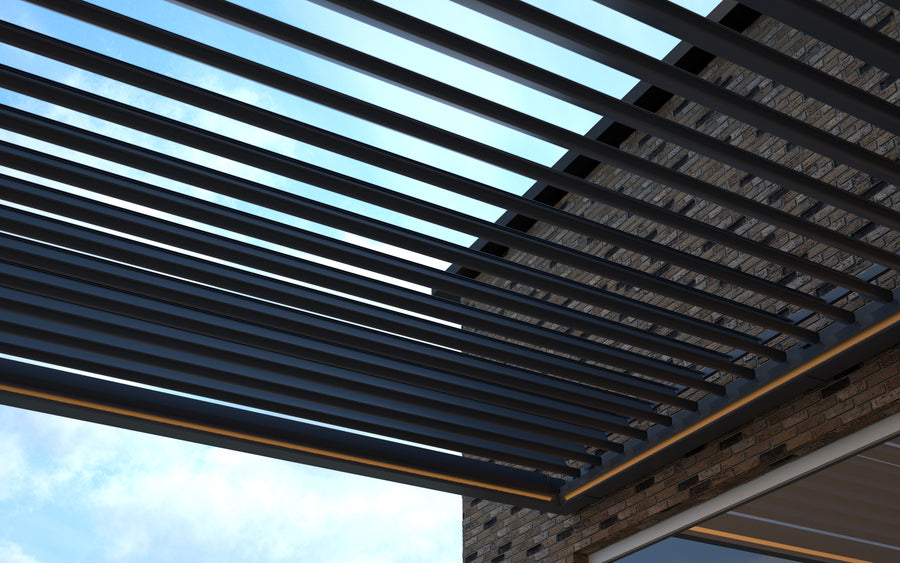 The Portico pergola in white from side showing louvre depth and post spacing