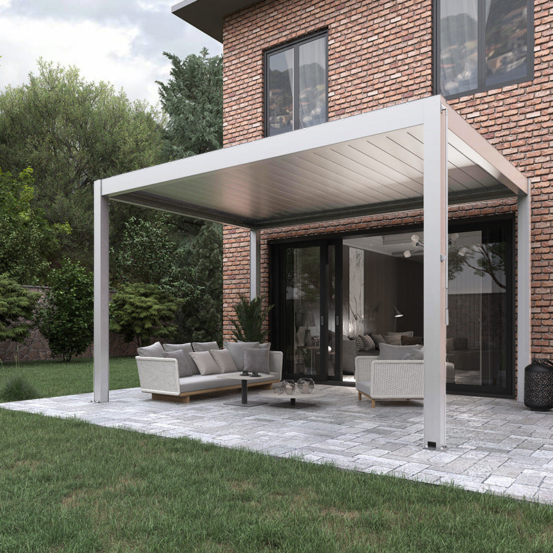 Deponti Pinela Manual louvred pergola in white with adjustable louvres in a garden setting