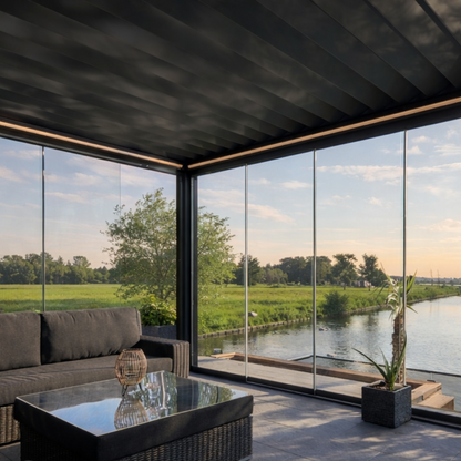 Deponti Pinela Deluxe retractable roof pergola in anthracite with panels fully open to sky