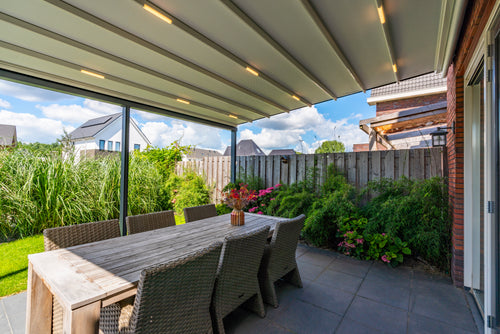 Aluminium Folding Roof Veranda | The Libero | Retractable Waterproof Fabric Roof | Integrated LED | Concealed Drainage Through Posts