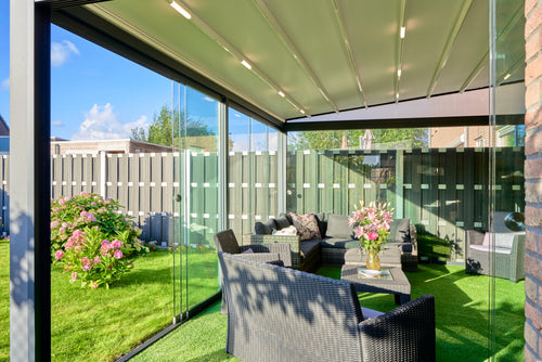 Aluminium Folding Roof Veranda | The Libero | Retractable Waterproof Fabric Roof | Integrated LED | Concealed Drainage Through Posts