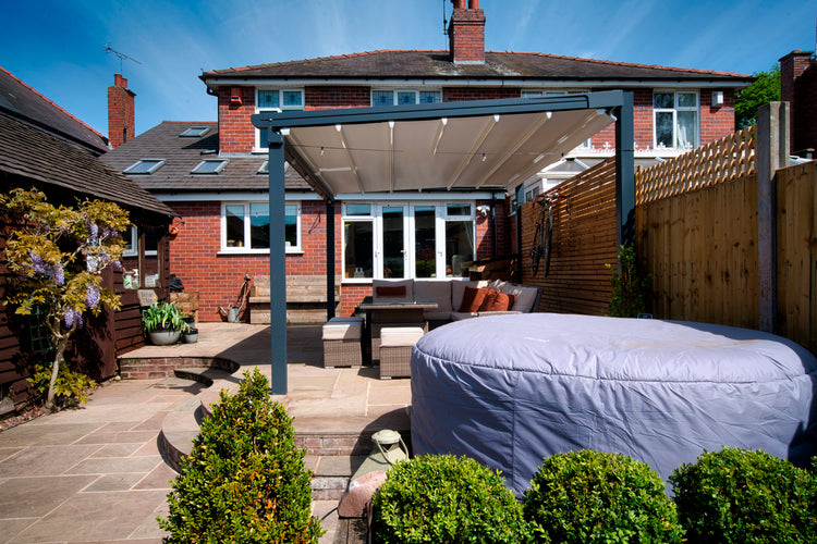 Aluminium Folding Roof Veranda | The Libero | Retractable Waterproof Fabric Roof | Integrated LED | Concealed Drainage Through Posts