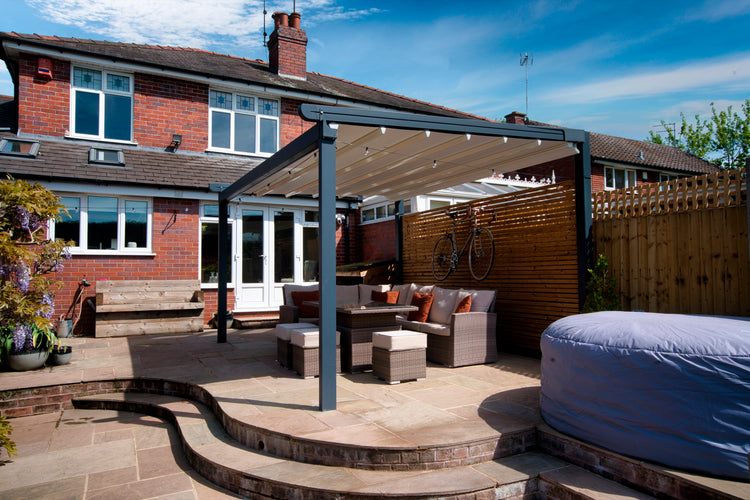 Aluminium Folding Roof Veranda | The Libero | Retractable Waterproof Fabric Roof | Integrated LED | Concealed Drainage Through Posts