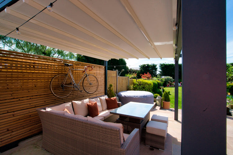 Aluminium Folding Roof Veranda | The Libero | Retractable Waterproof Fabric Roof | Integrated LED | Concealed Drainage Through Posts
