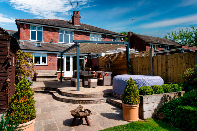 Aluminium Folding Roof Veranda | The Libero | Retractable Waterproof Fabric Roof | Integrated LED | Concealed Drainage Through Posts