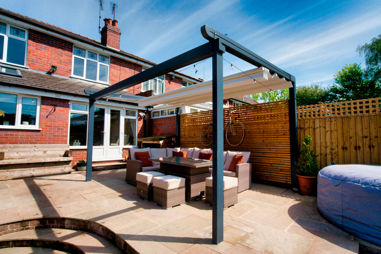 Aluminium Folding Roof Veranda | The Libero | Retractable Waterproof Fabric Roof | Integrated LED | Concealed Drainage Through Posts