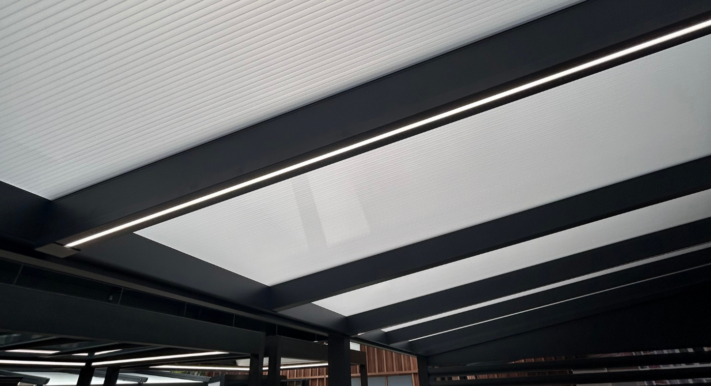 LED strip lighting installed in a veranda beam, warm white 2700K glow along the rafter