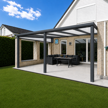 The Cascina veranda in anthracite on a grey render home, garden aspect