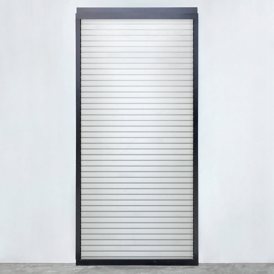 Louvred sliding door panel in anthracite with white slats, light and privacy controlled