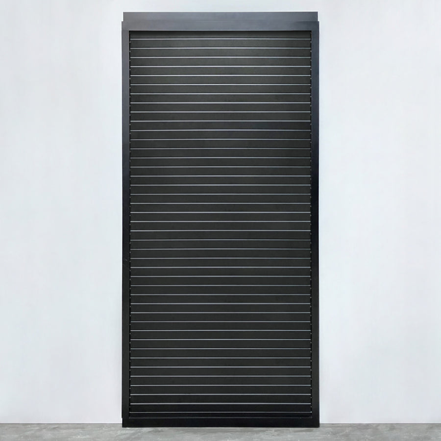 Roma Anta louvred sliding panel in black with black slats on a veranda enclosure