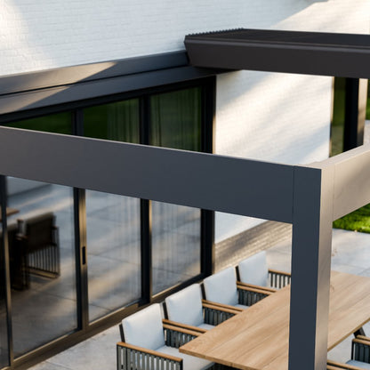 Aperto pergola in anthracite from garden, panels angled to filter afternoon sun