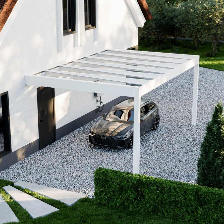 The Rimessa glass roof carport in anthracite from garden at dusk