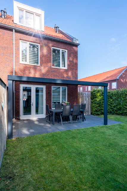 Luxa veranda in anthracite from garden corner showing span and post detail