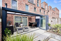 The Luxa veranda in anthracite from garden perspective, full span visible