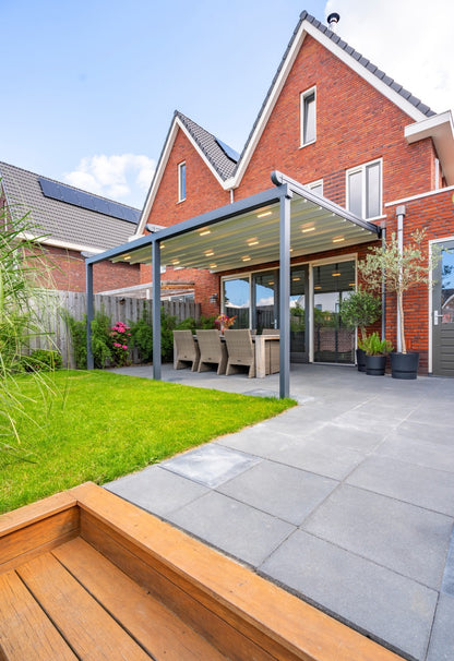 The Libero veranda in anthracite on a rendered modern home, rear elevation