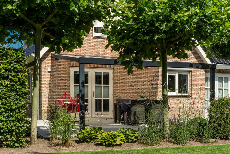 Luxa veranda in anthracite at dusk with integrated LED lighting active below