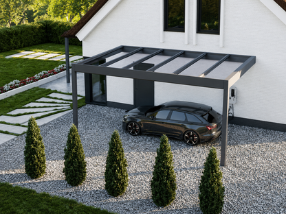 Rimessa wall-mounted carport in anthracite on a brick home, driveway below