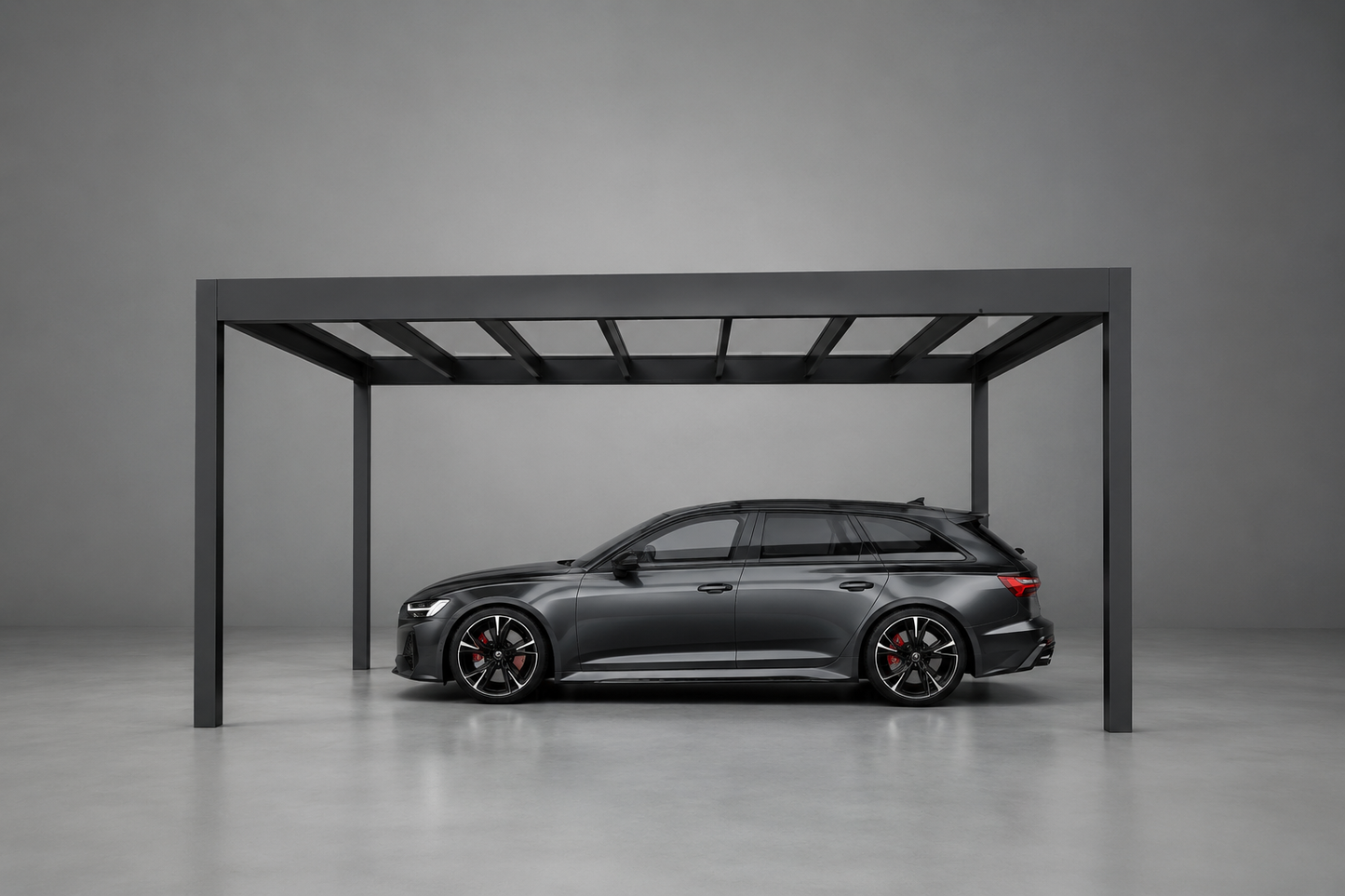 The Rimessa carport in anthracite at dusk, LED lighting illuminating the driveway