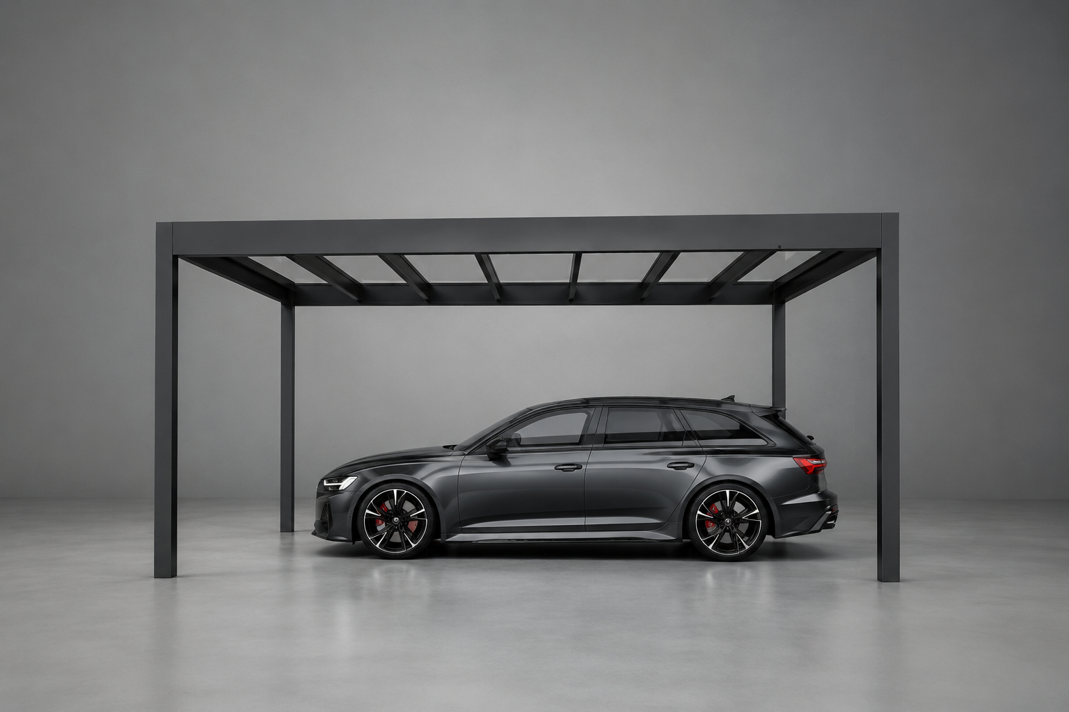 The Rimessa carport in anthracite at dusk, LED lighting illuminating the driveway