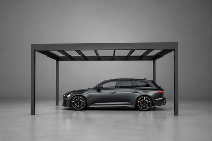 The Rimessa carport in anthracite at dusk, LED lighting illuminating the driveway