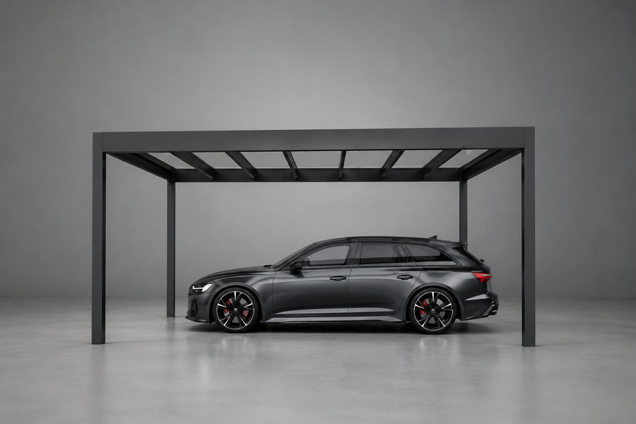 The Rimessa carport in anthracite at dusk, LED lighting illuminating the driveway