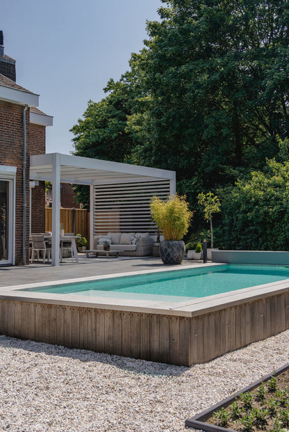 The Cristallo pergola in anthracite on a flat-fronted contemporary home, rear aspect