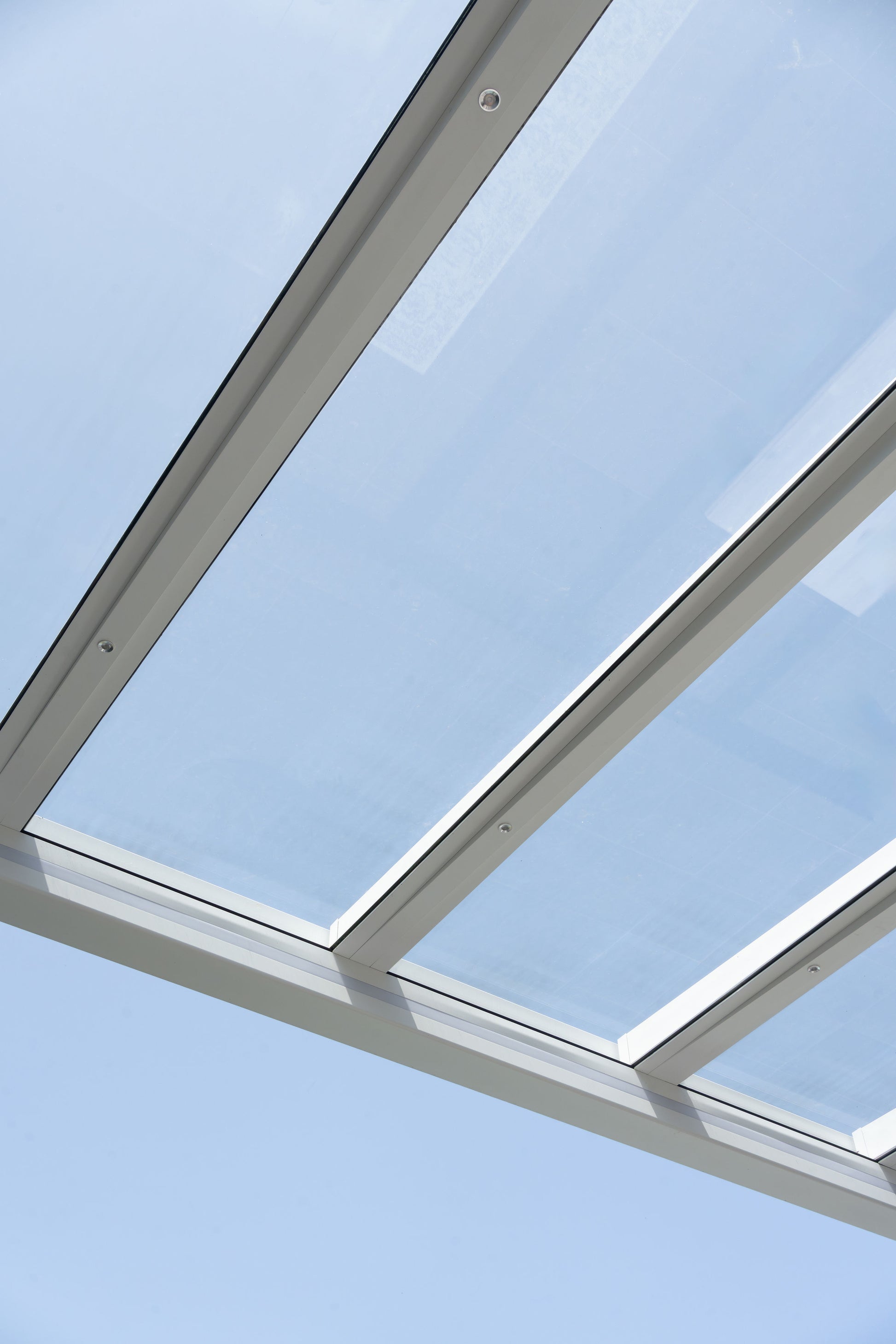 The Cristallo pergola in anthracite from inside looking out through the glass roof