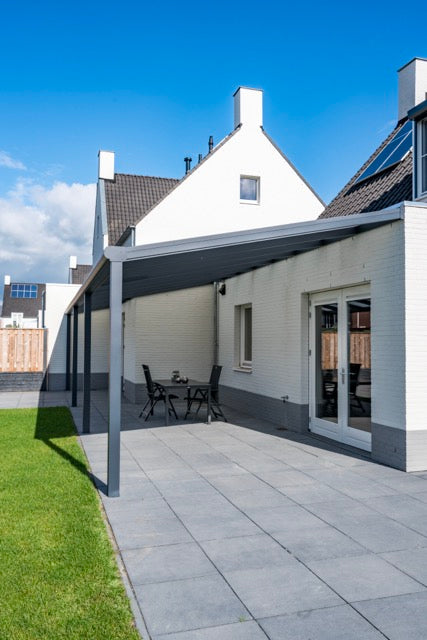 Wide Cascina veranda in anthracite with multiple bays covering a large rear garden