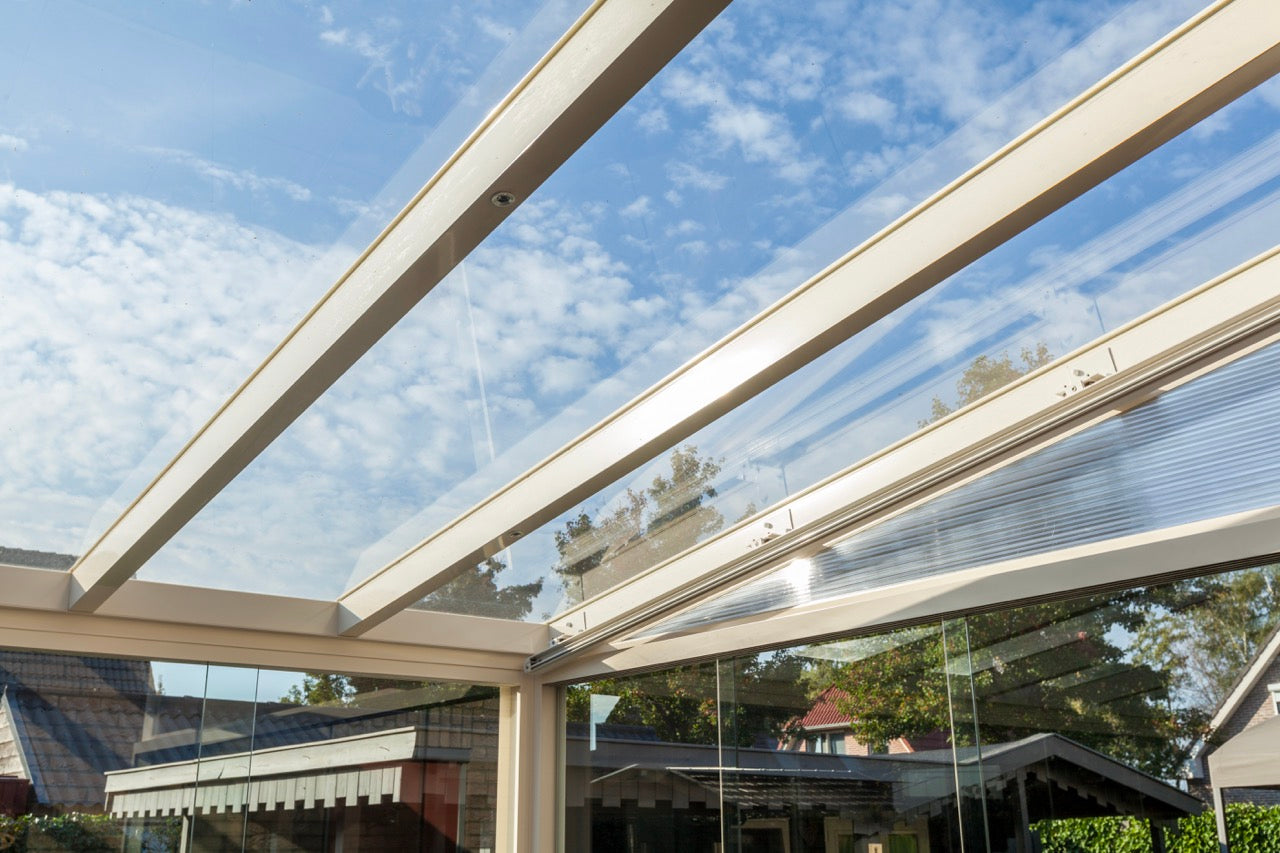 The Nobile veranda in anthracite from garden showing full width and beam run