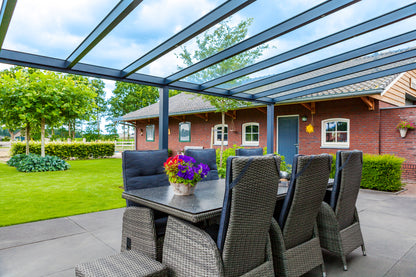The Nobile veranda in anthracite on a rendered detached home, oblique angle