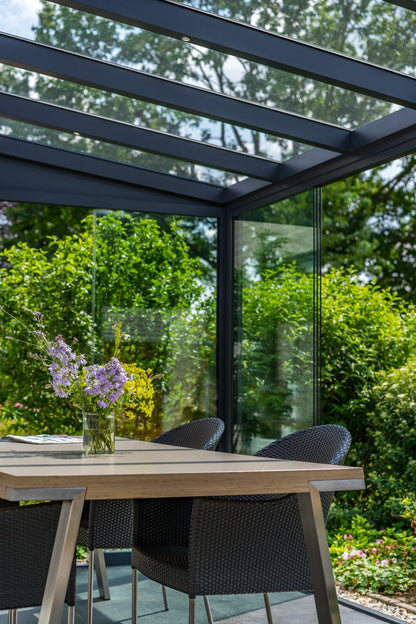 The Nobile veranda in black from garden perspective at dusk
